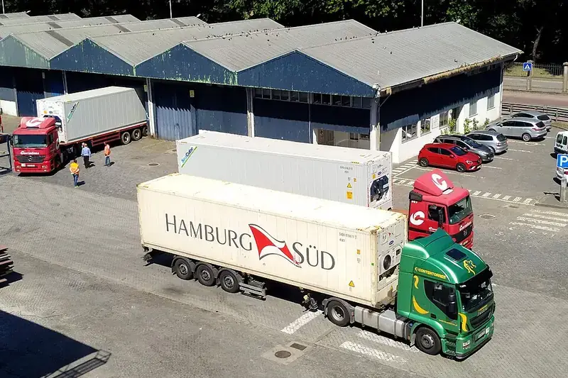 Refrigerated container trailers at a cold-store depot