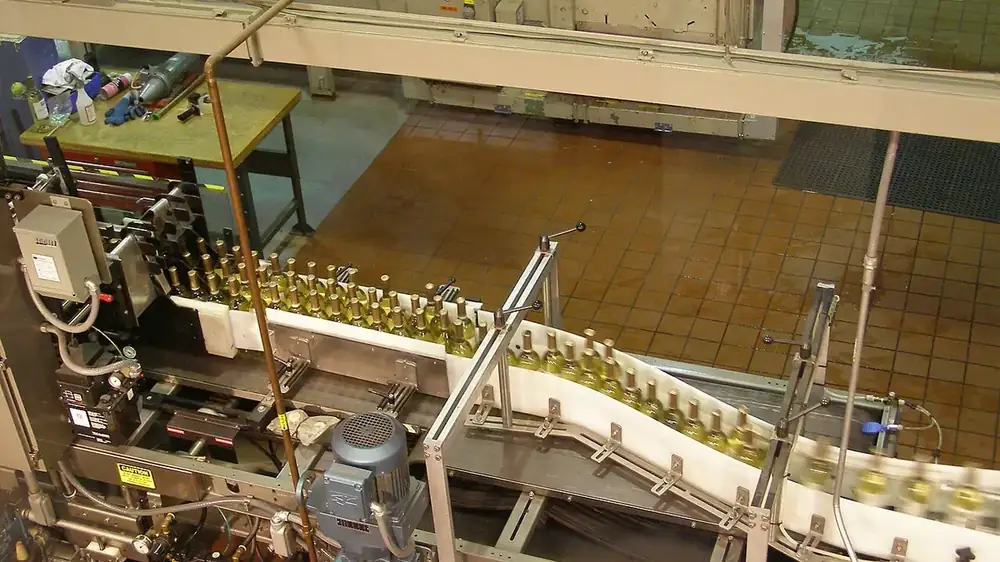 Bottles moving along a bottling line